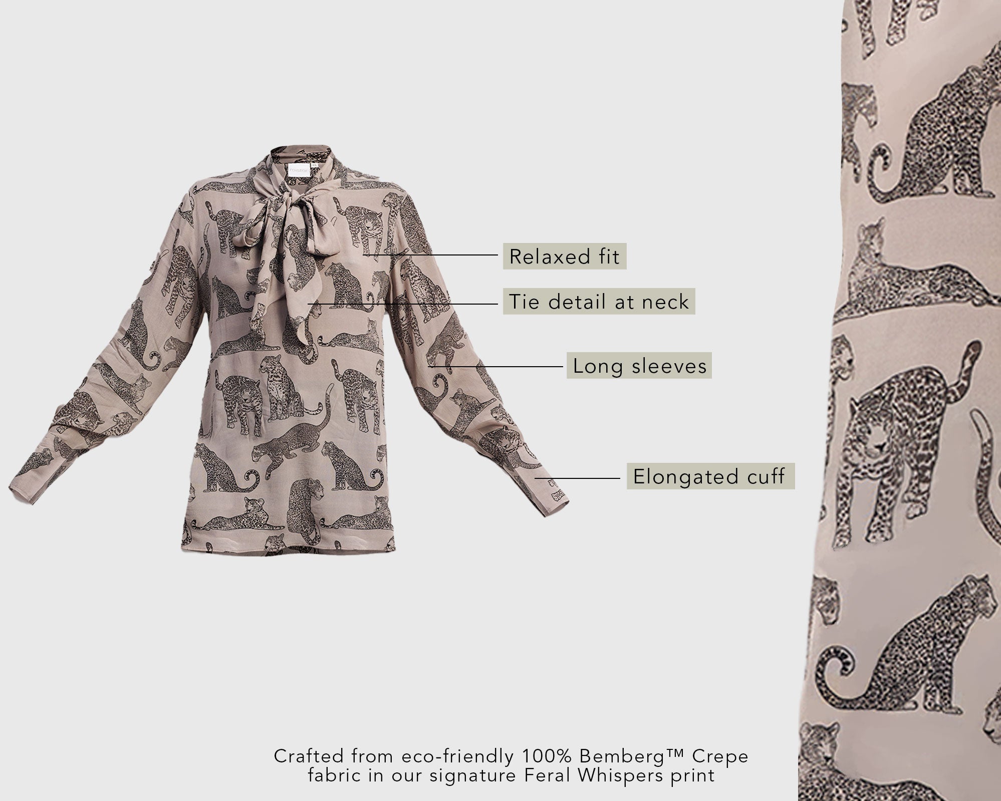 Long-sleeve blouse with animal pattern and label text on a white background