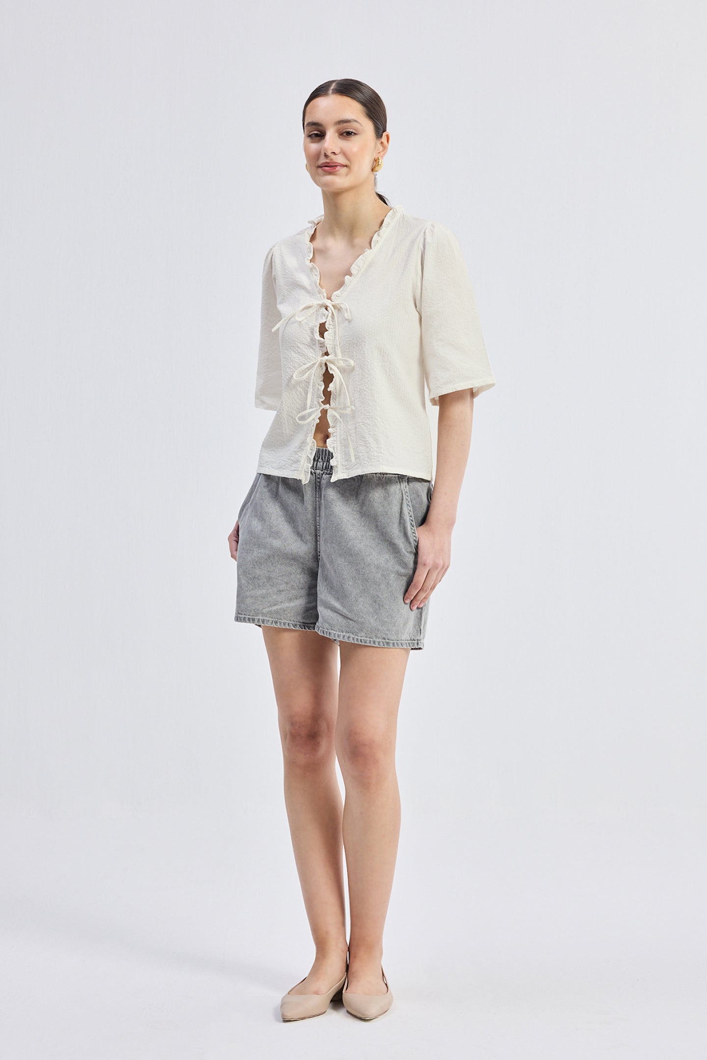 Relaxed Fit Top With Ruffles and Front-Ties in Cream Longshot