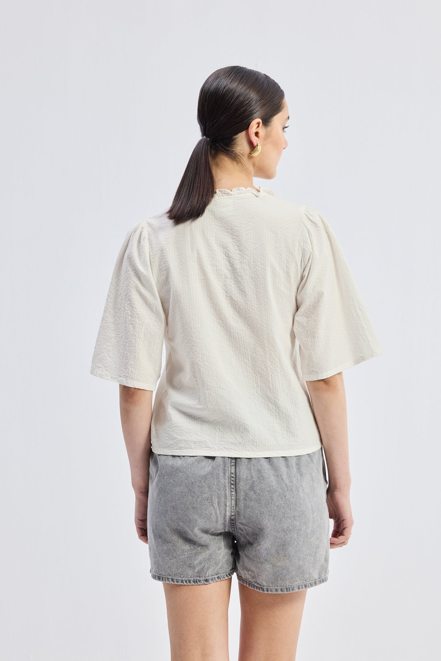 Relaxed Fit Top With Ruffles and Front-Ties in Cream Longshot