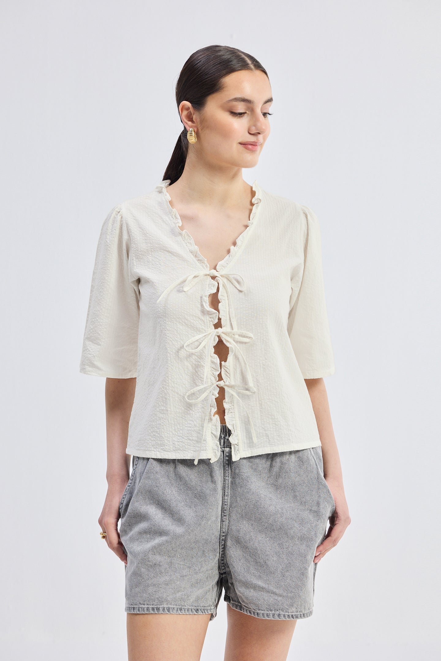 Relaxed Fit Top With Ruffles and Front-Ties in Cream Longshot