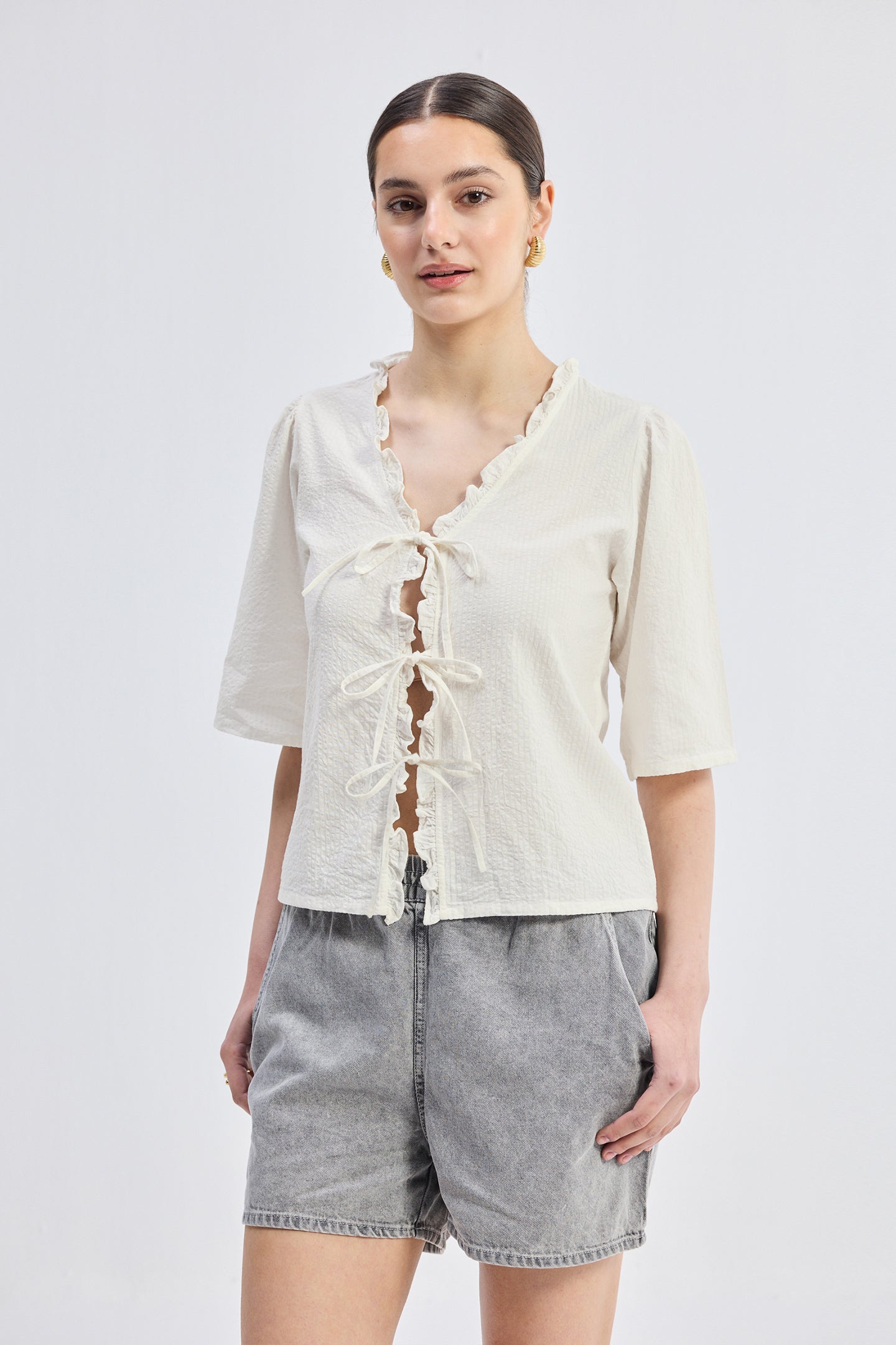 Relaxed Fit Top With Ruffles and Front-Ties in Cream Longshot