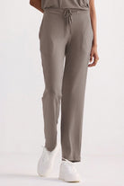 Eco-friendly Relaxed Tee Set in Earth Grey displayed as a two-piece set including a crew neck top and drawstring pants.