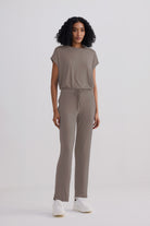 Woman wearing the Reistor Relaxed Tee Set in Earth Grey, an eco-friendly modal blend loungewear set.