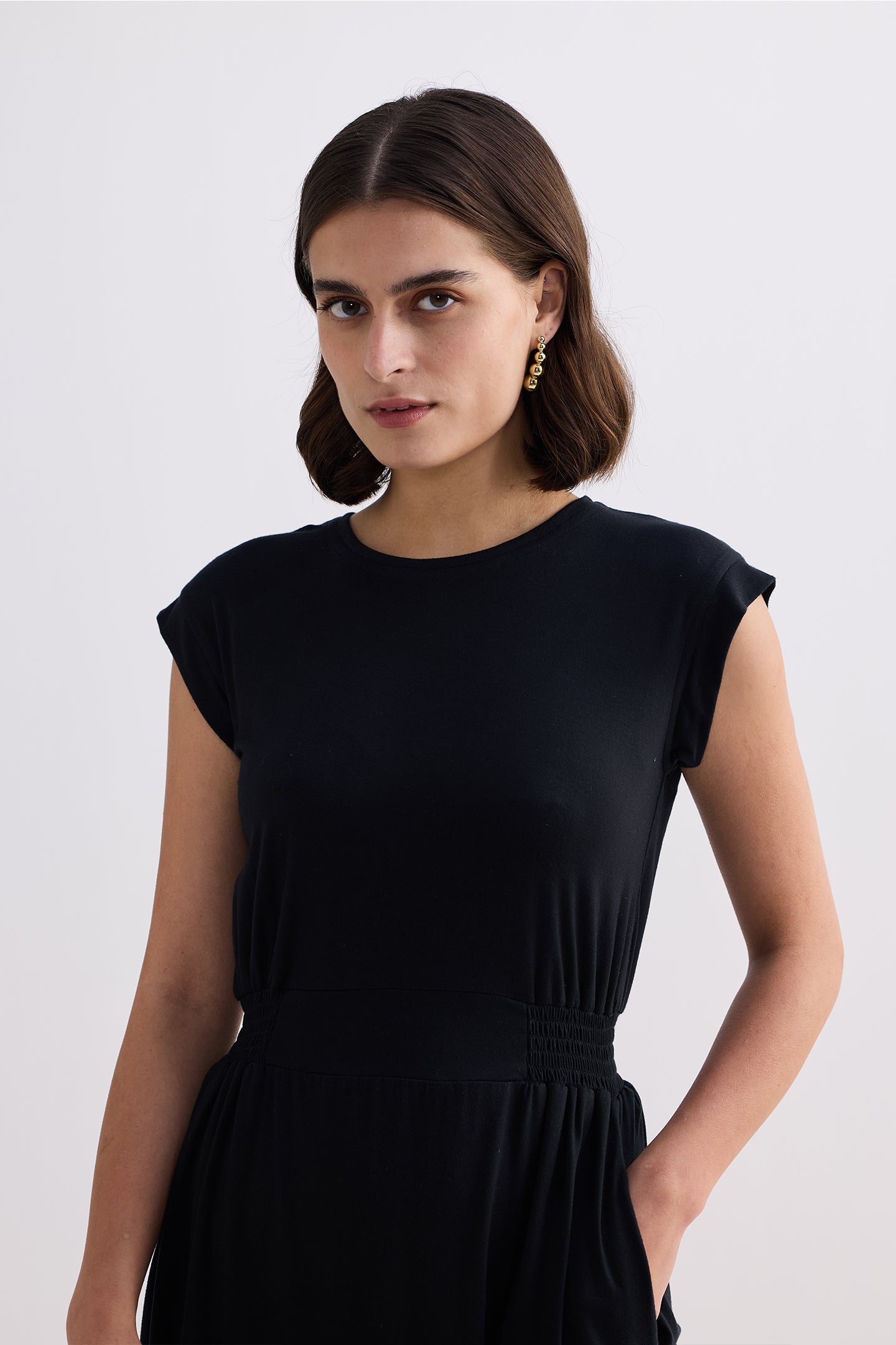Short Dress With Smocking Side Detail in Black Closeup