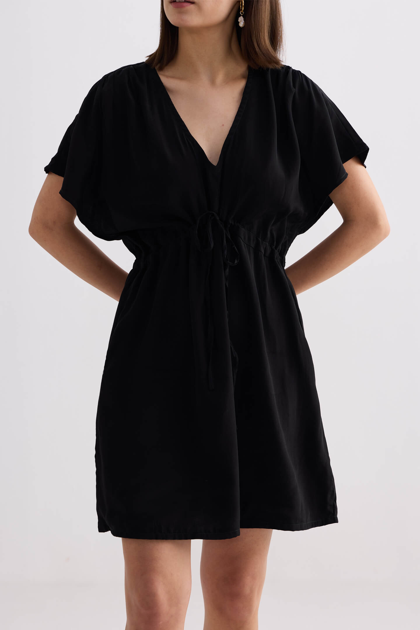 Short gathered Dress in Black Closeup