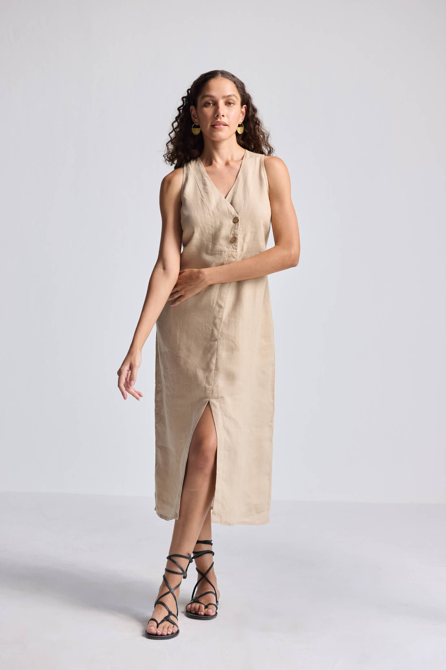 Straight Dress with Front Slit in Neutral Beige Hemp by Reistor, full-length view featuring a sleeveless V-neck silhouette, front button detailing, and eco-friendly breathable fabric for women