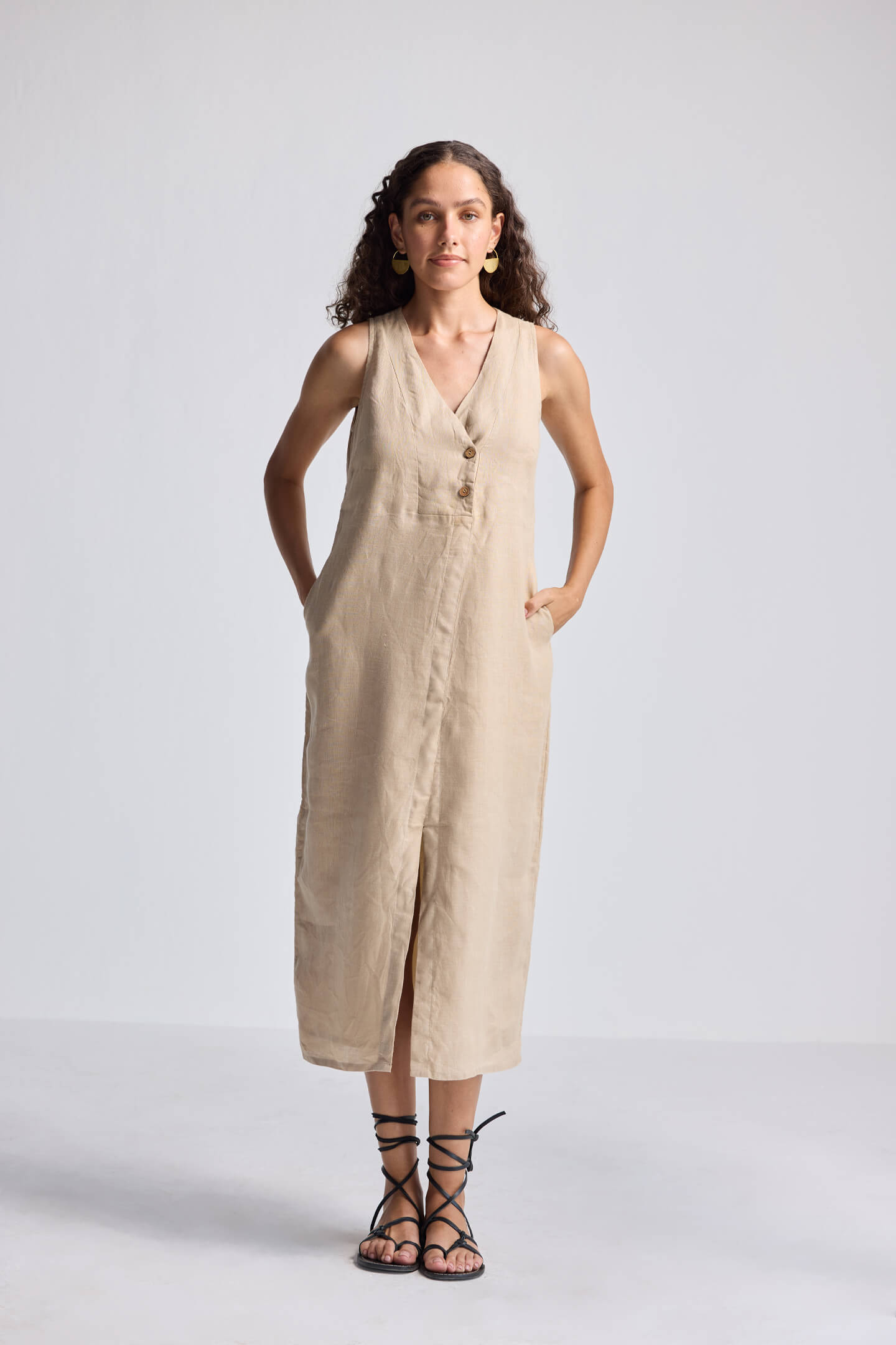 Straight Dress with Front Slit in Neutral Beige Hemp by Reistor, front-facing full-length view highlighting the sleeveless V-neck silhouette, button-front detail, and breathable sustainable fabric for women