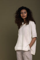 Reistor The Hemp Hoodie in soft off white featuring breathable hemp fabric, a relaxed silhouette, and effortless comfort