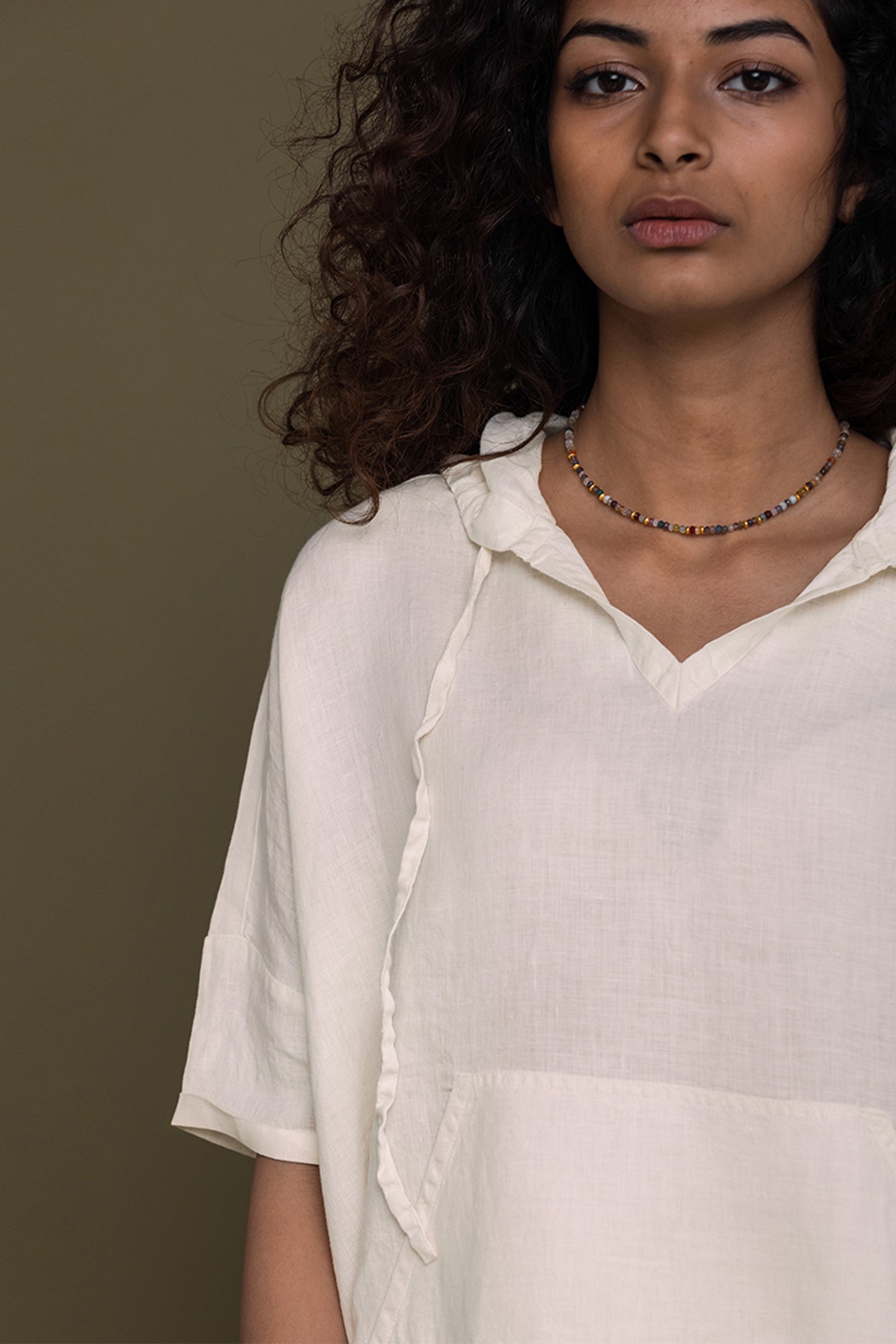 Reistor The Hemp Hoodie featuring a soft V neckline, breathable hemp fabric, relaxed fit, and effortless casual elegance