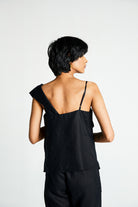 Reistor The Wandering Wave Top in Black, sustainable women's sleeveless top with an open back design, breathable fabric, and a relaxed fit for everyday wear.