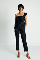 Reistor Power Moves Shirt in Black, sleeveless button-front shirt crafted from sustainable fabric with a relaxed fit, perfect for workwear and everyday style.