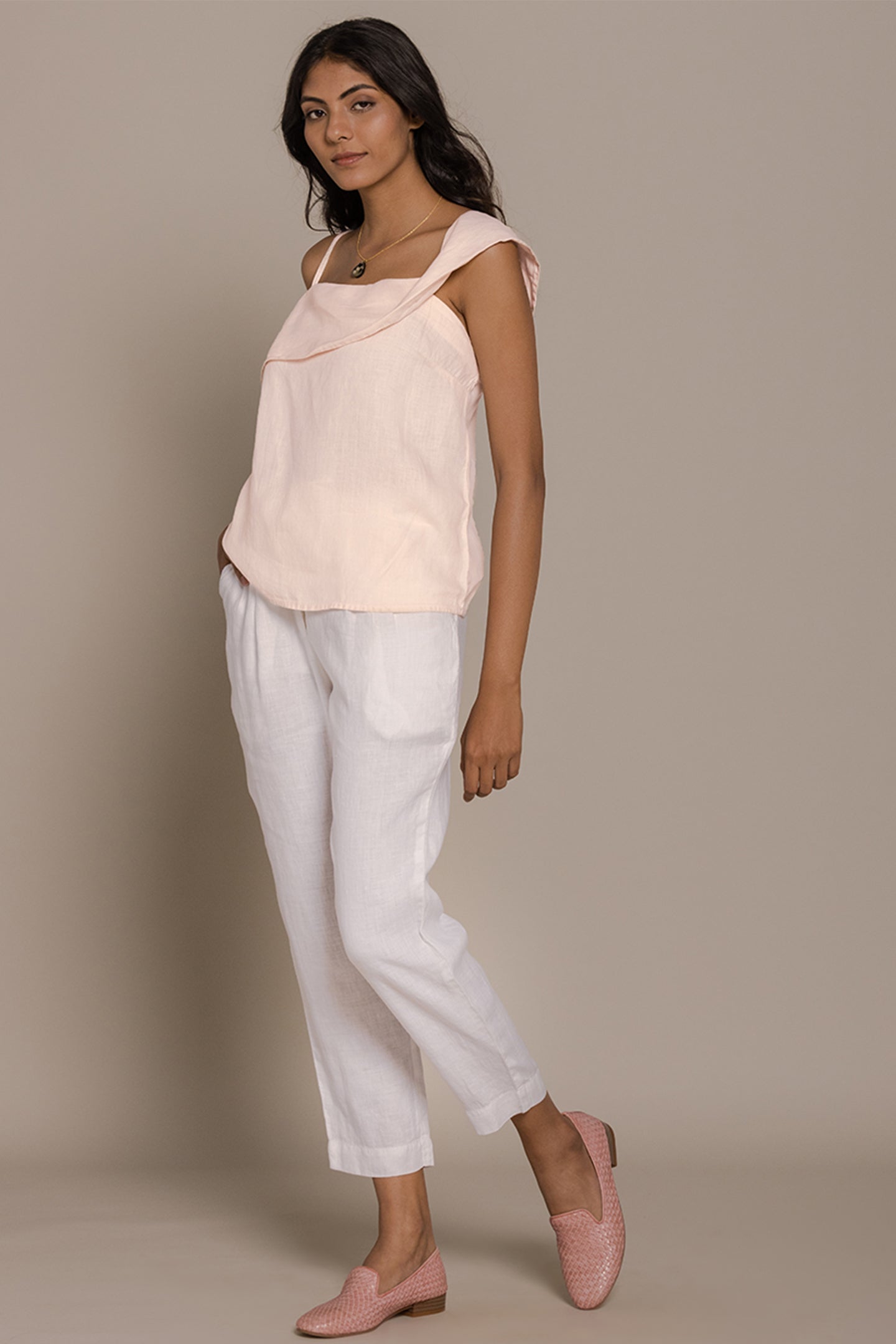 Reistor The Wandering Wave Top in Ice Pink styled for a relaxed vacation-ready outfit with easy charm.