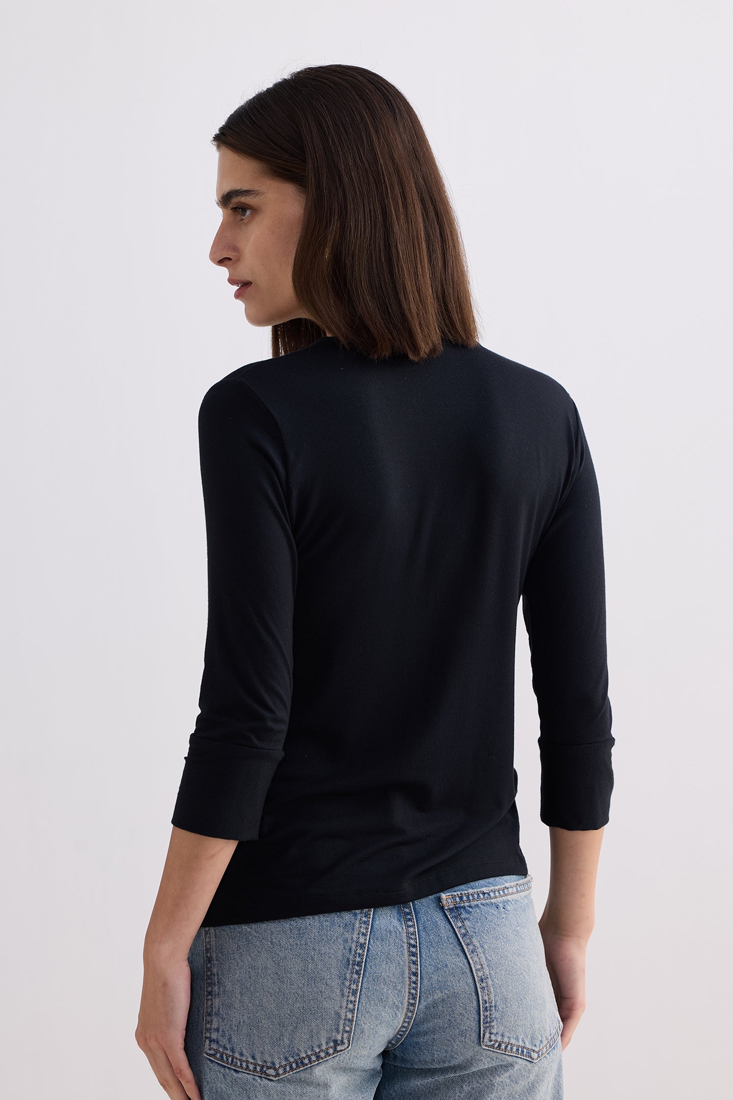 Twist Front Knit Shirt in Black Longshot