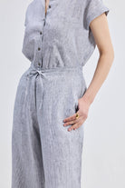 Sustainable Wide Leg Linen Pants in a grey striped pattern by Reistor, featuring a drawstring waist.