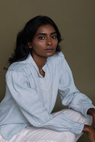 Reistor Wild River Shirt in Blue for women, crafted from breathable sustainable fabric with a relaxed fit, full sleeves and an effortlessly elegant everyday look.