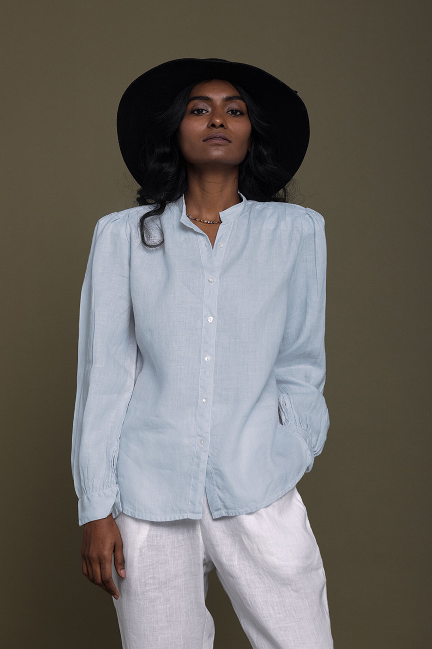 Reistor Wild River Shirt in Blue for women, styled with a relaxed fit, breathable sustainable fabric and full sleeves for an elegant, modern everyday wardrobe.