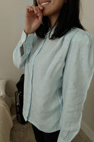 Close-up of the Reistor Wild River Shirt in Blue, showcasing lightweight eco-friendly fabric, a minimalist silhouette and timeless everyday elegance.
