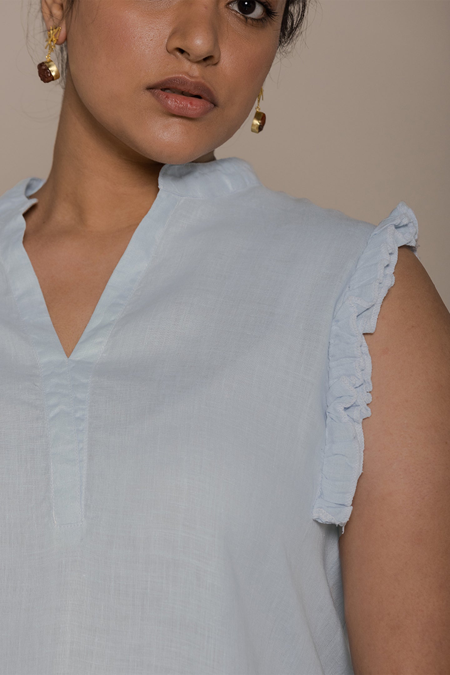 Reistor Wind in my Hair Shirt in Blue designed with graceful frill sleeves, breathable fabric and a relaxed contemporary fit.
