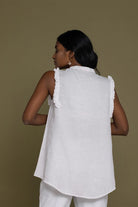Reistor Wind in my Hair Shirt in White back view with delicate ruffle sleeves and an airy relaxed silhouette