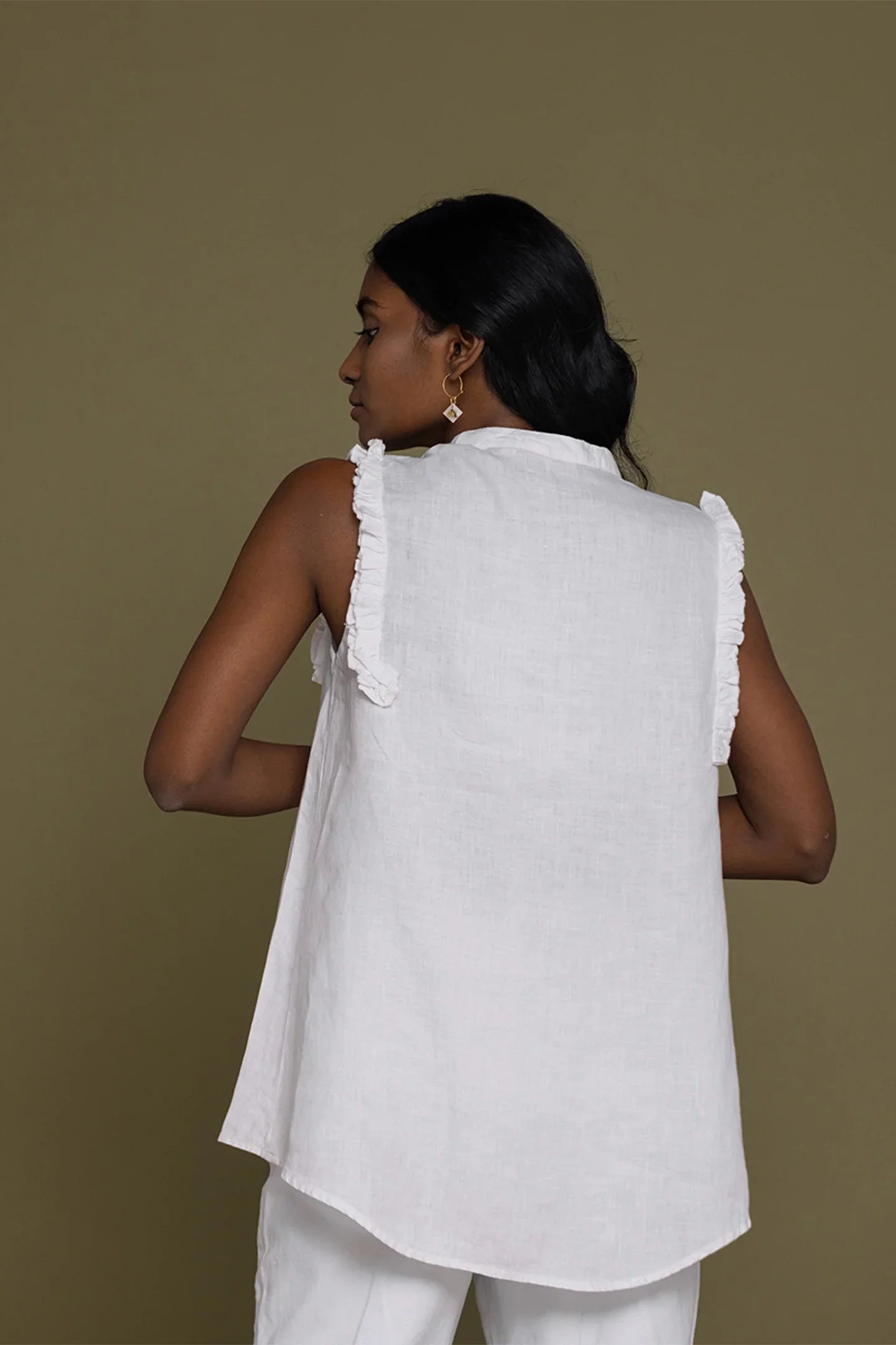Reistor Wind in my Hair Shirt in White back view with delicate ruffle sleeves and an airy relaxed silhouette