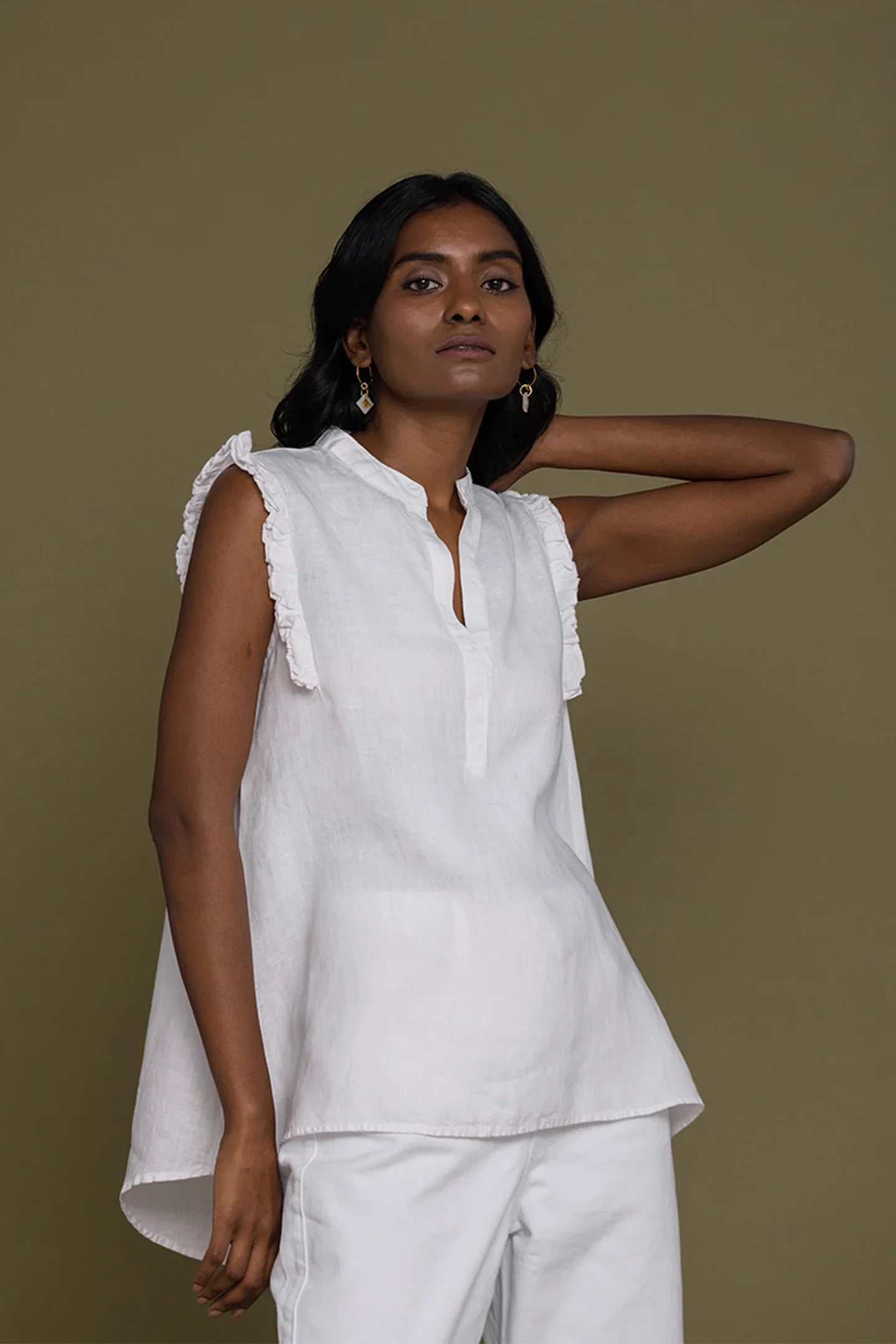 Reistor Wind in my Hair Shirt in White for women with ruffle sleeves, split neckline and flowing relaxed silhouette