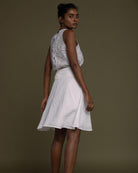 white straight comfort-fit skirt with an embroidered belt to accentuate the waistline.