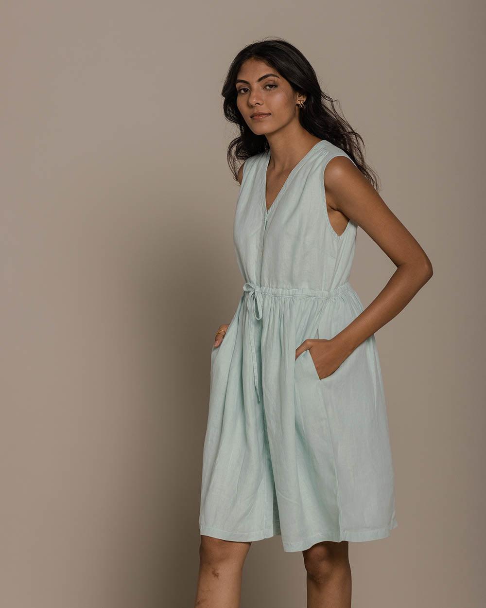 reistor Pina Colada Season Dress in pastel blue with relaxed silhouette, sleeveless design and functional pockets