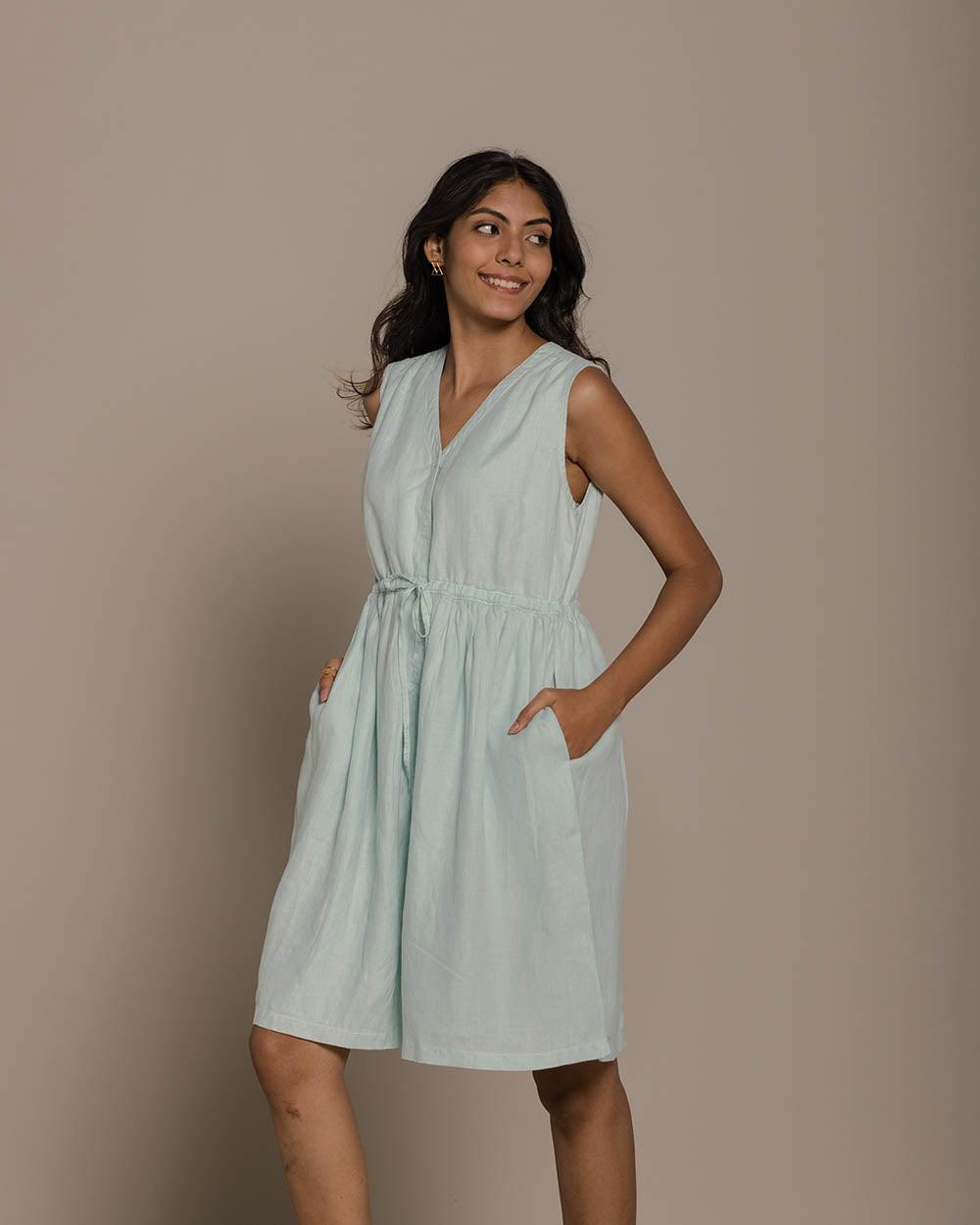 reistor Pina Colada Season Dress in pastel blue with sleeveless V-neck, gathered waist, pockets and relaxed summer fit