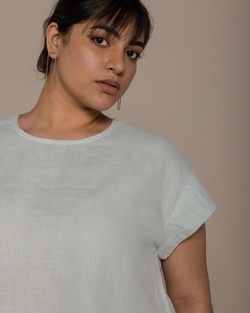 mint mini sleeves top with a peephole back, timeless yet comfortable 