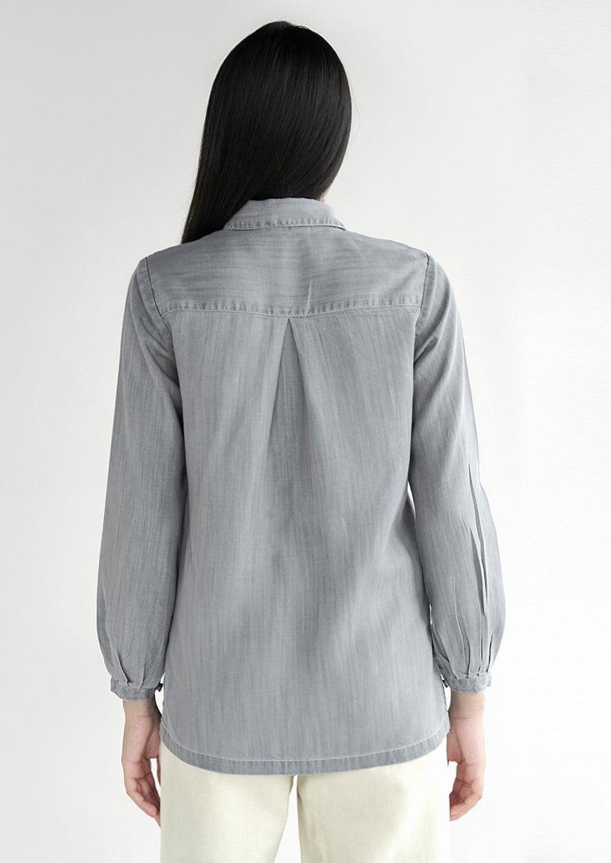 Back view of the Reistor Shades of Everyday Top in Stone Grey, featuring a relaxed silhouette, lightweight fabric and timeless everyday style for women.