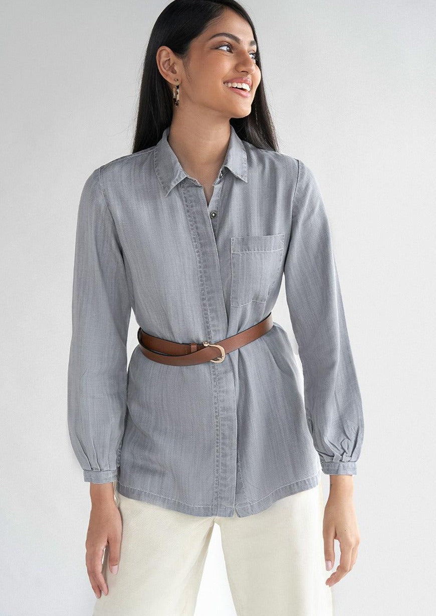 Front view of the Reistor Shades of Everyday Top in Stone Grey with a button-front closure, chest pocket and soft breathable fabric for versatile styling.