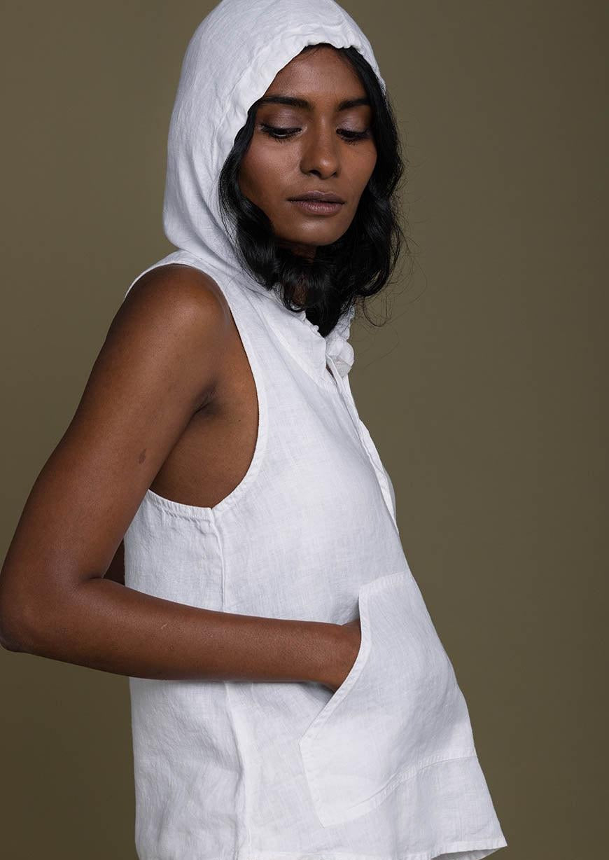 white sleeveless drawstring hoodie with kangaroo pockets