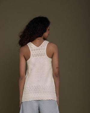 off white T back top with a v neck and embroidered details front and behind