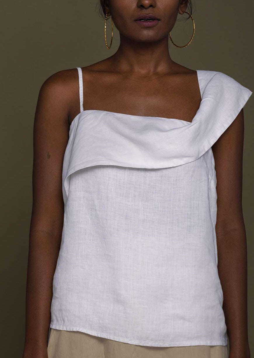white one-shoulder flat strap top with a flattering neckline