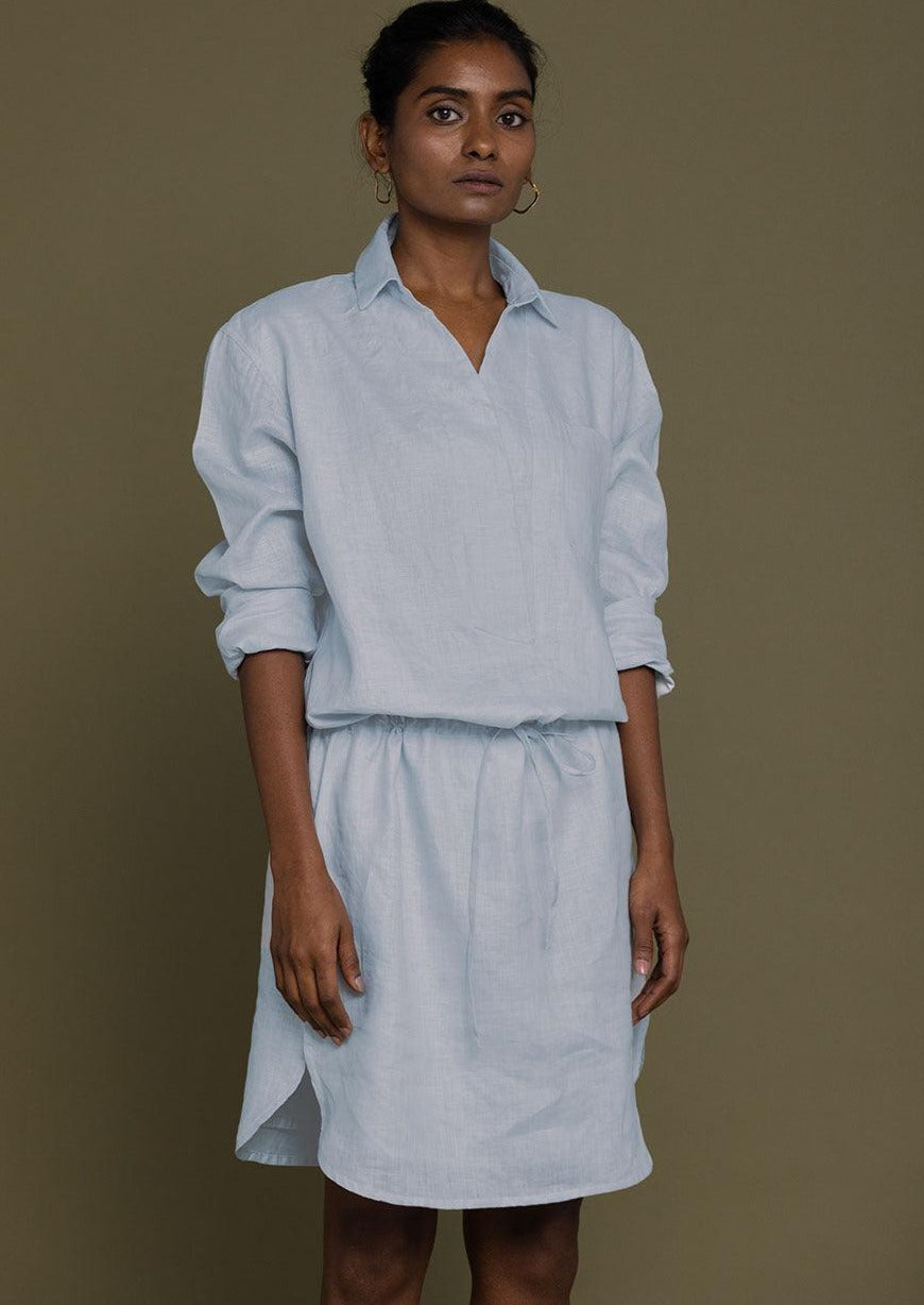 summer blue collared shirt dress with a drawstring on the waist to give it more definition.